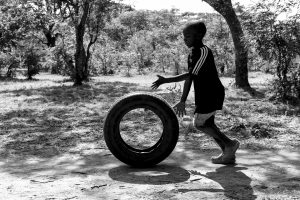 richard_alton_361_boy_chasing_tyre2d14bd524f.jpg