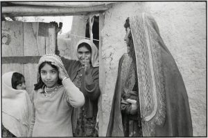 B0005-1ns-women-outside-compound-Meymanah-waving54057a1bd2.jpg